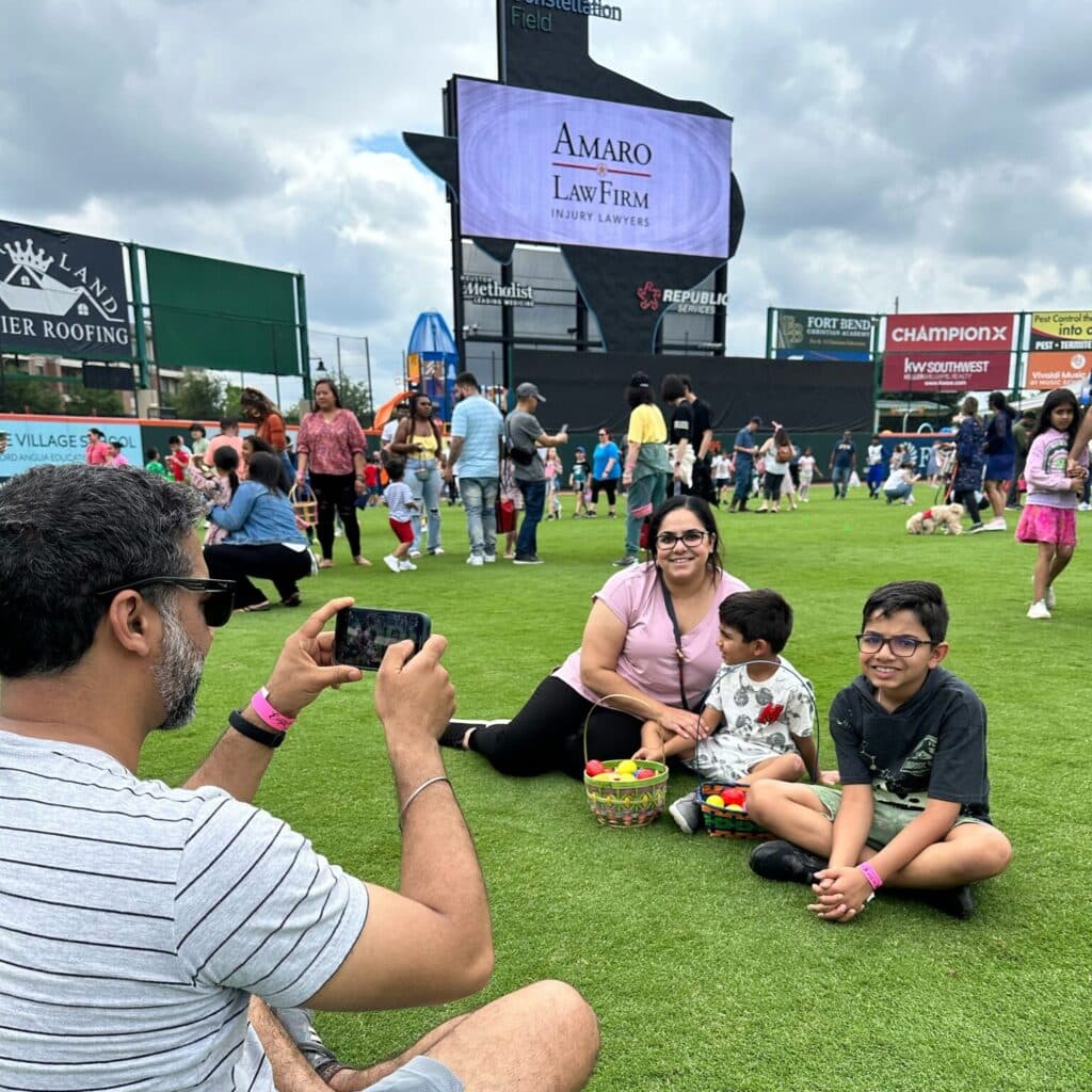 Families at the Amaro Law Firm Easter egg hunt