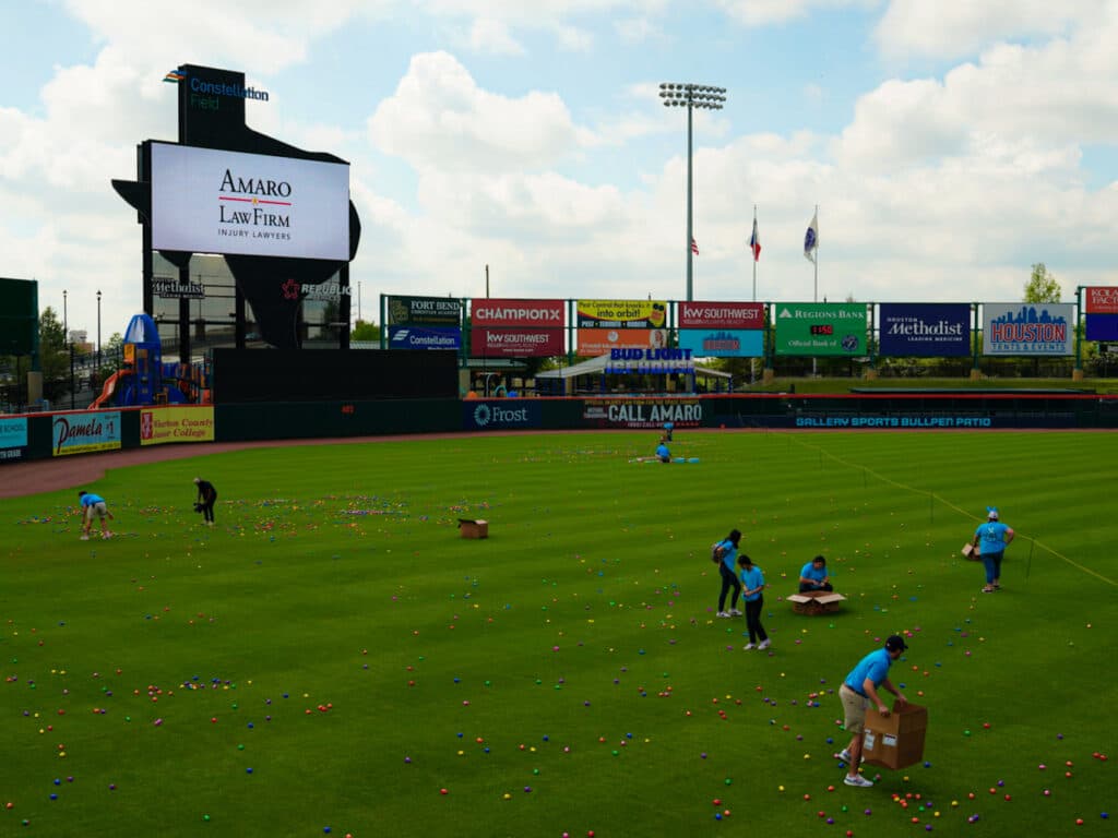 Easter egg hunt on the outfield at Constellation Field in Sugar Land